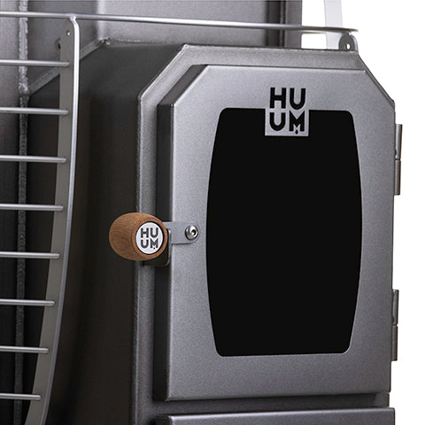 HUUM wood burning sauna stove heater with metal door and wooden handle for sauna rooms