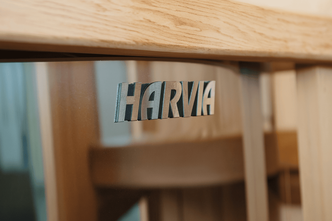 Harvia logo on a wooden bench of an indoor traditional sauna for home by SunRay