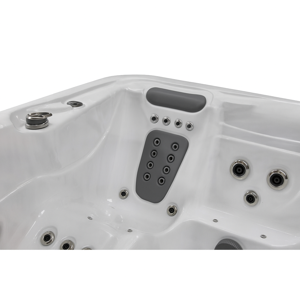 Close-up of white Luxury Spa Infinity Elite Series hot tub interior showing massage jets and headrest