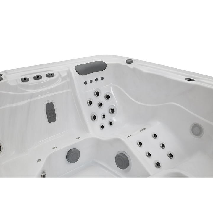 Luxury Spa Infinity Elite Series hot tub white interior with multiple adjustable massage jets