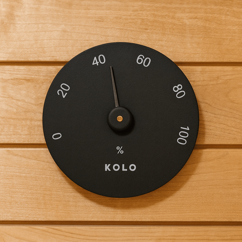 KOLO hygrometer for sauna displaying humidity levels on a wooden sauna wall