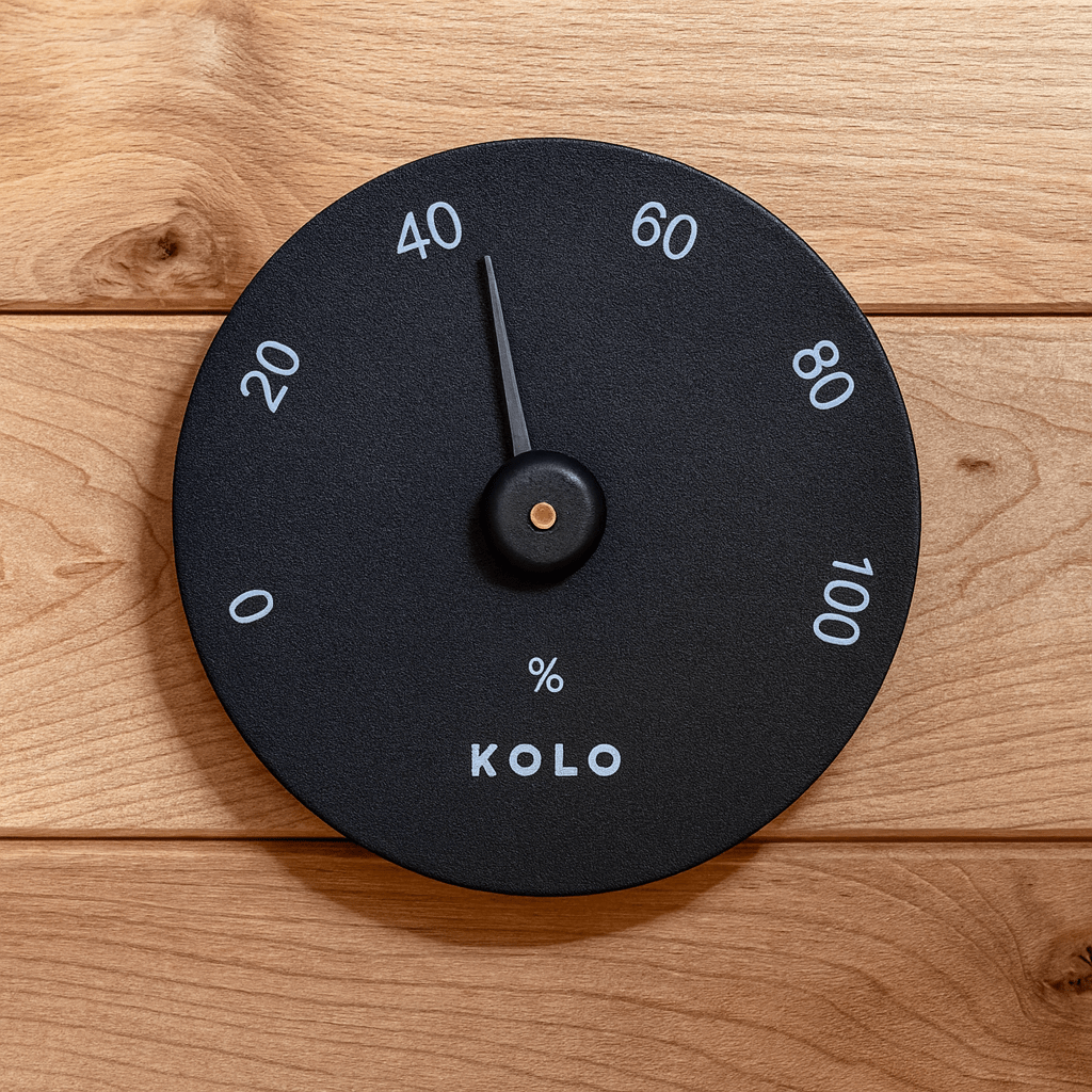 KOLO hygrometer for sauna displaying humidity levels on a sleek black design