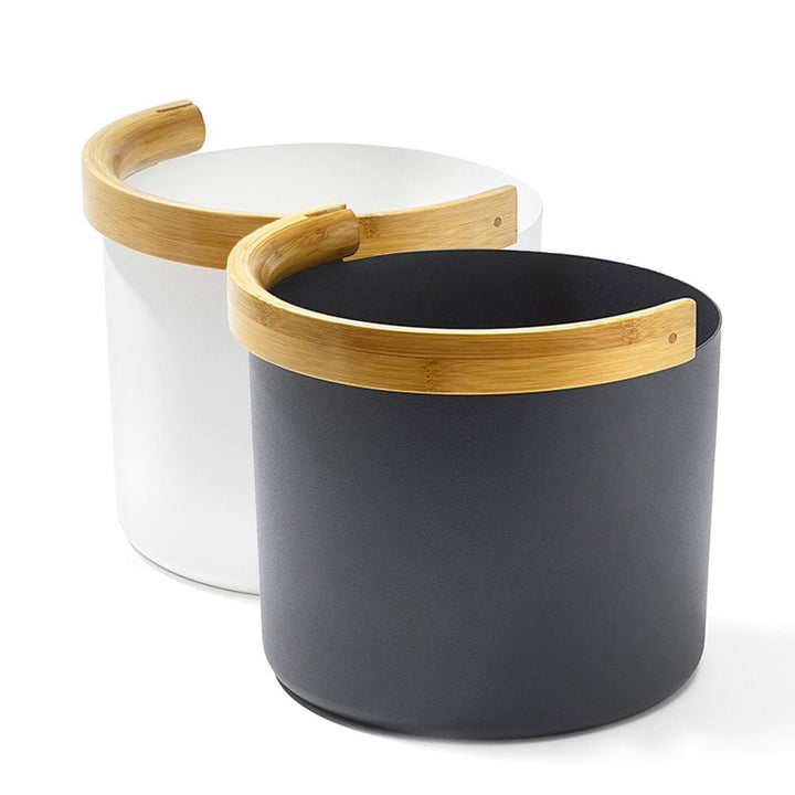 KOLO sauna bucket set featuring a black and white design with stylish bamboo handles