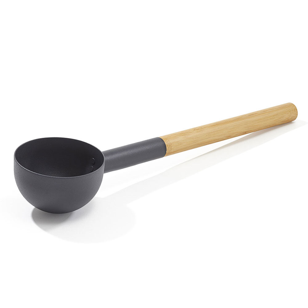 KOLO sauna ladle with wood handle featuring a black scoop and natural wooden grip