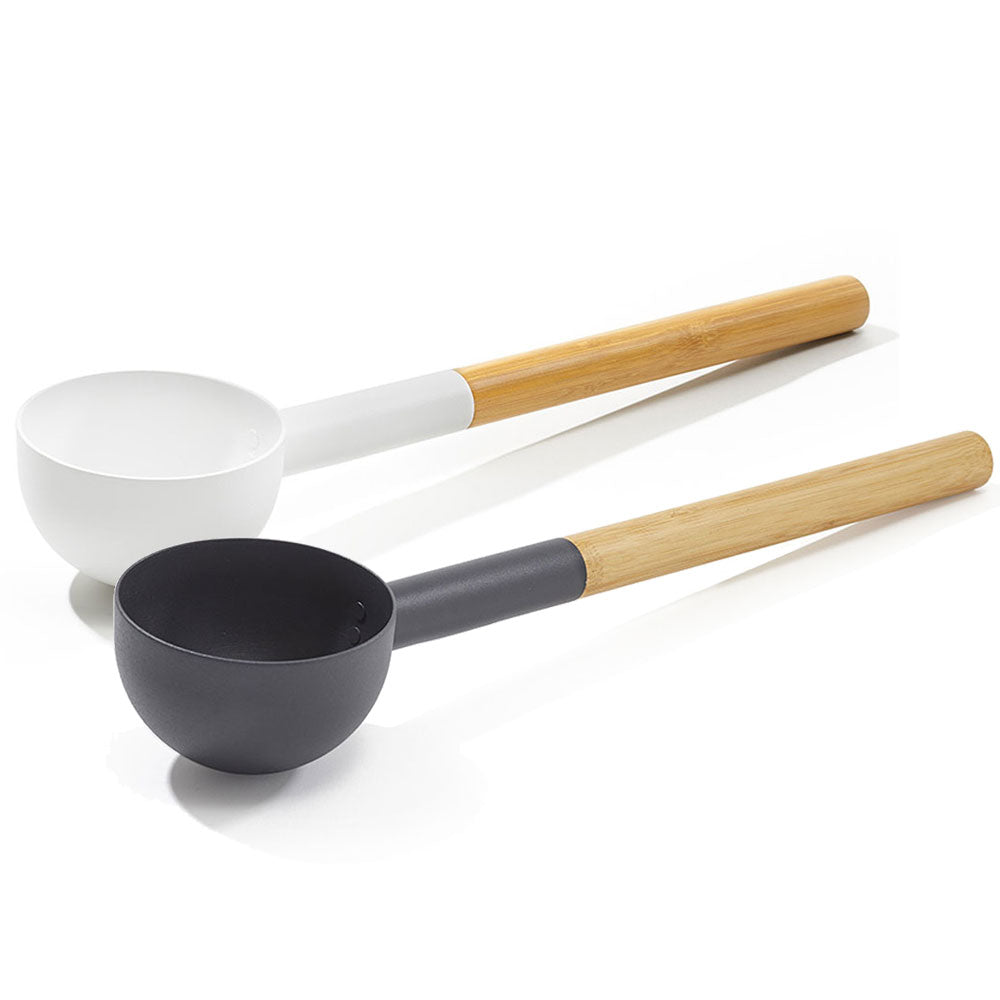 Two KOLO sauna ladle with wood handle in black and white with long wooden handles