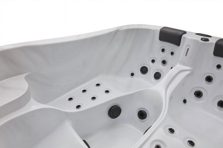 Luxury Spa Largo Studio Series hot tub white interior with multiple jets and ergonomic seating