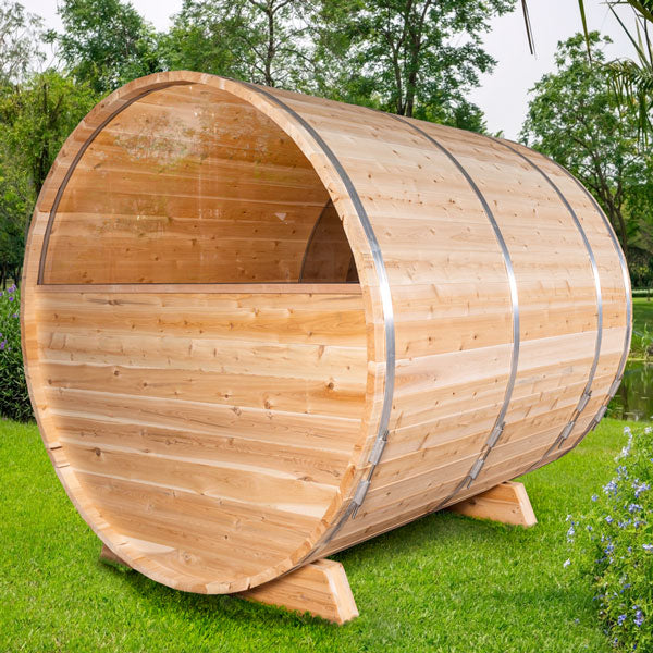 Leisurecraft luxury barrel sauna made of natural wood with metal bands on a green lawn
