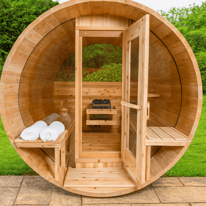 Leisurecraft luxury barrel sauna with wooden interior, benches, and a glass door for relaxation