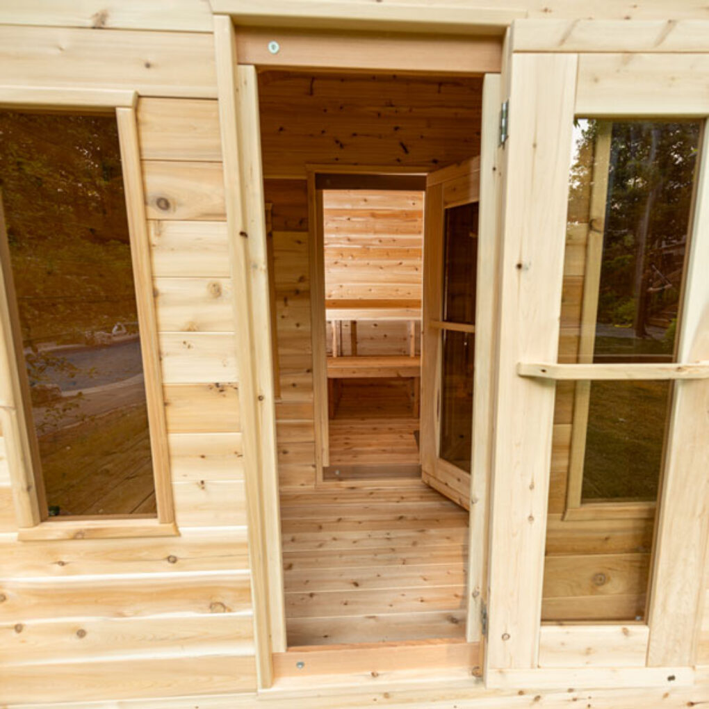 Leisurecraft traditional luxury cabin sauna with wooden interior and glass door open view