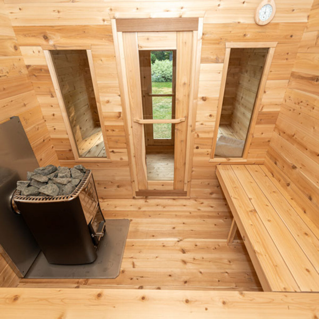 Leisurecraft traditional sauna interior with wooden benches and heater in luxury cabin sauna design