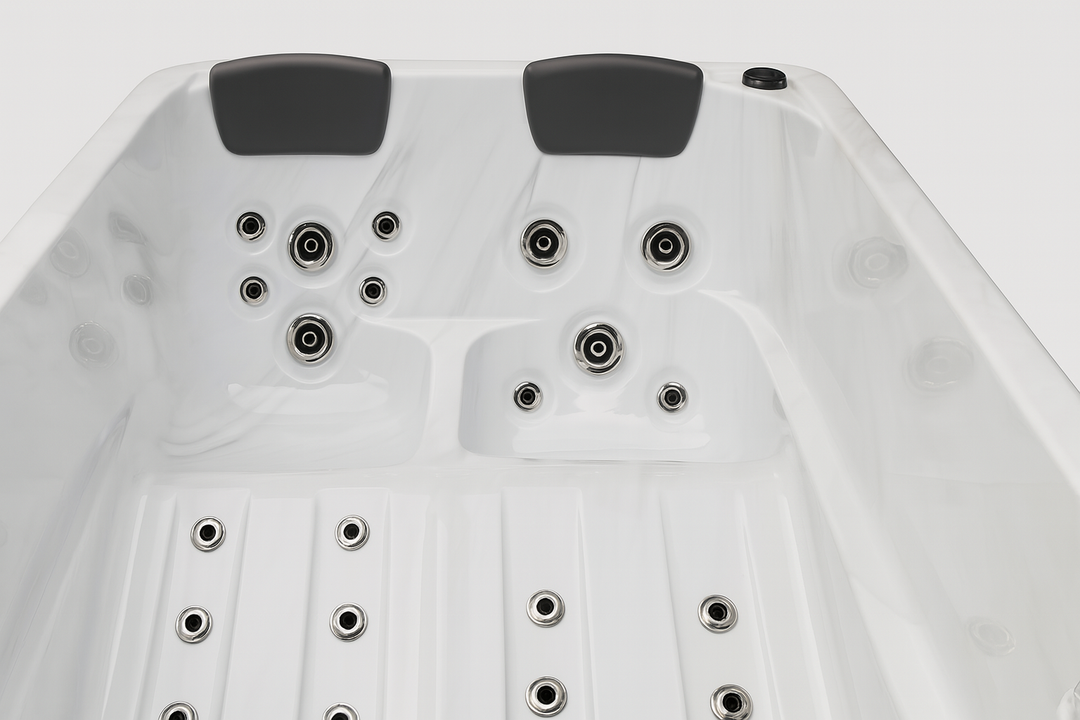 Luxury hot tub by Luxury Spa with multiple jets and two black headrests for comfortable seating