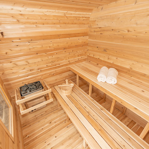 Leisurecraft traditional outdoor luxury sauna interior with wooden benches sauna heater and towels