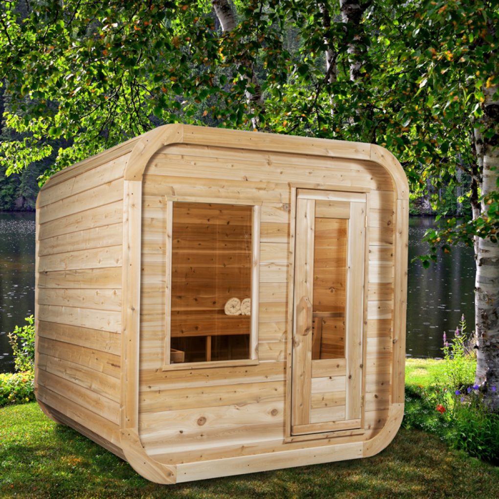 Leisurecraft traditional outdoor luxury sauna made of natural wood with glass door and window by a lakeside