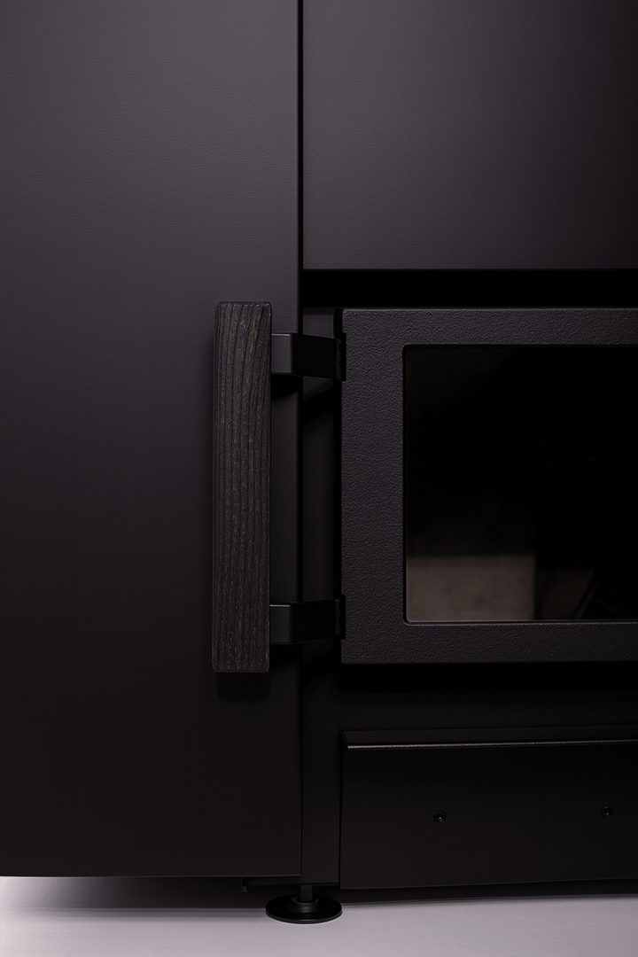 Close-up of Narvi Kaamos 20 wood sauna stove door handle and viewing window for easy access and monitoring