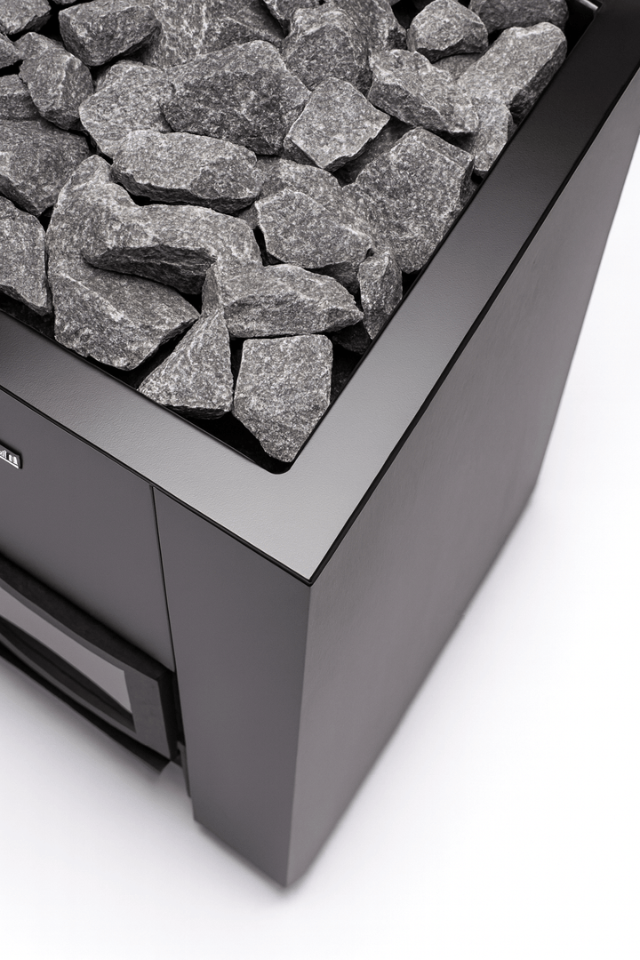 Narvi Kaamos 20 wood sauna stove featuring a sleek design and volcanic stones on top