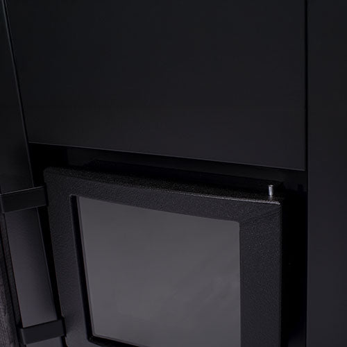 Close up of Narvi Kaamos 20 wood sauna stove black cast iron door and glass window on modern sauna heater