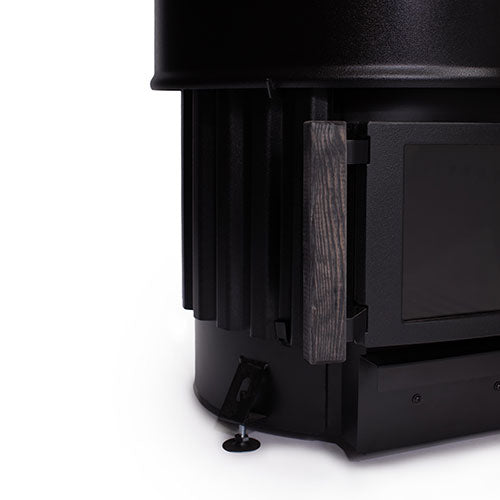 Close up of Narvi Luosto wood-burning sauna stove black cast iron body with wooden door handle and heat fins