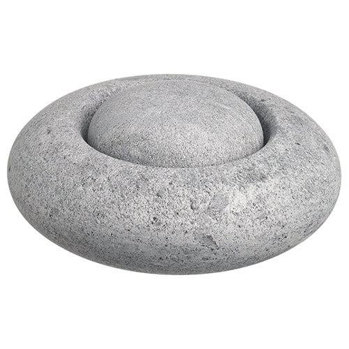 Hukka Finnish soapstone sauna accessory round donut shaped gray stone with domed center for sauna use