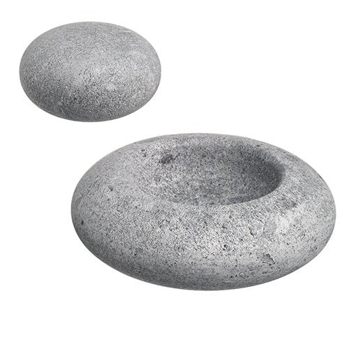 Hukka Finnish soapstone sauna accessory two gray rounded stones one hollowed bowl and one pebble for sauna use