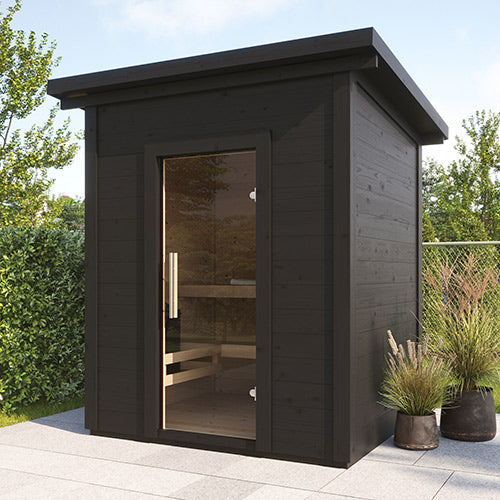 SaunaLife traditional outdoor home sauna kit in black wood with glass door on patio