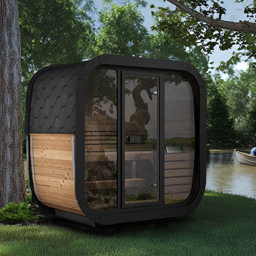 SaunaLife traditional outdoor home sauna kit with wooden panels and glass door beside a lake