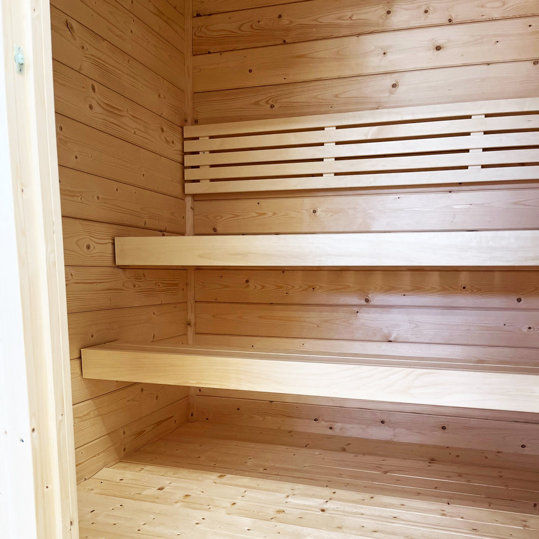 Interior view of SaunaLife traditional wooden sauna with bench seating outdoor home sauna kit