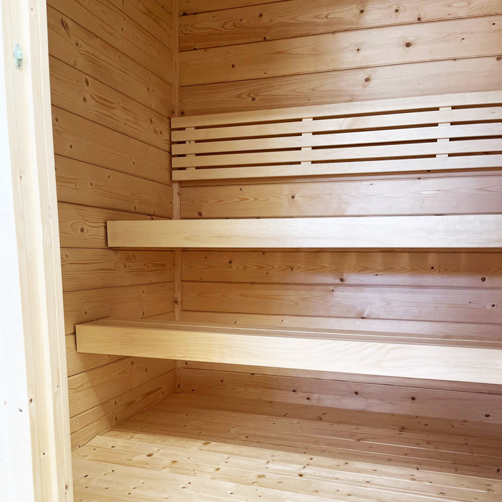 Interior view of SaunaLife traditional wooden sauna with bench seating outdoor home sauna kit