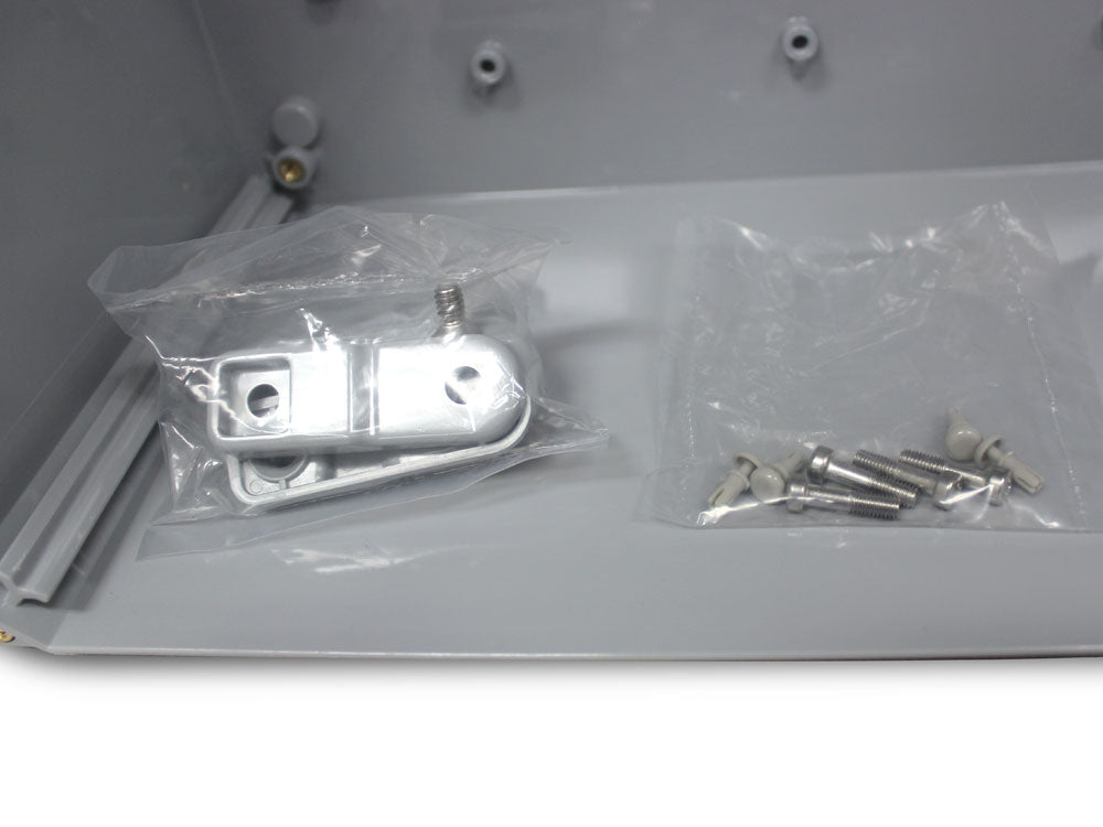 SaunaLife outdoor spa lighting equipment box metal mounting brackets and screws inside gray enclosure