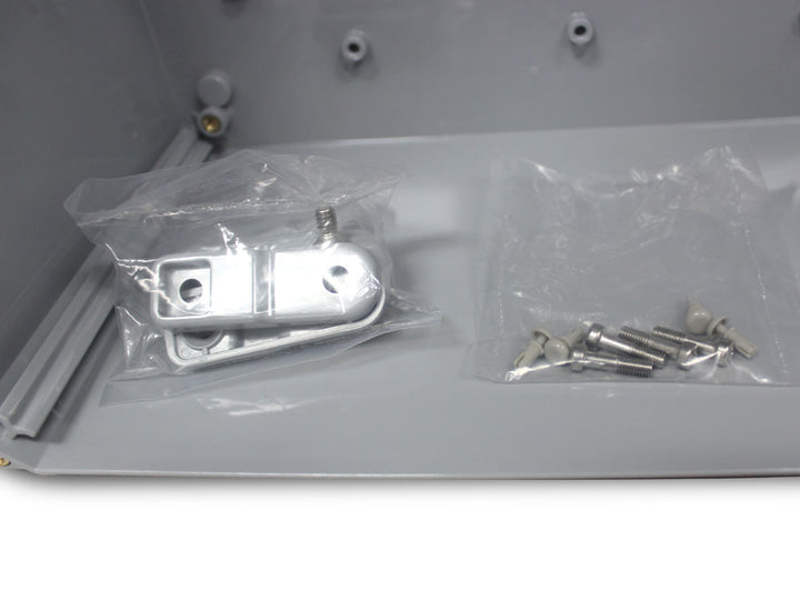 SaunaLife outdoor spa lighting equipment box metal mounting brackets and screws inside gray enclosure