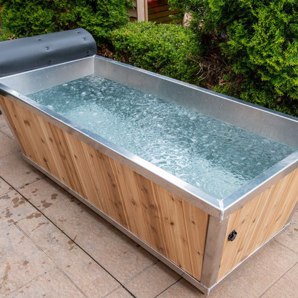 Leisurecraft Polar Plunge Tub for sale with a sleek wooden design and bubbling cold water