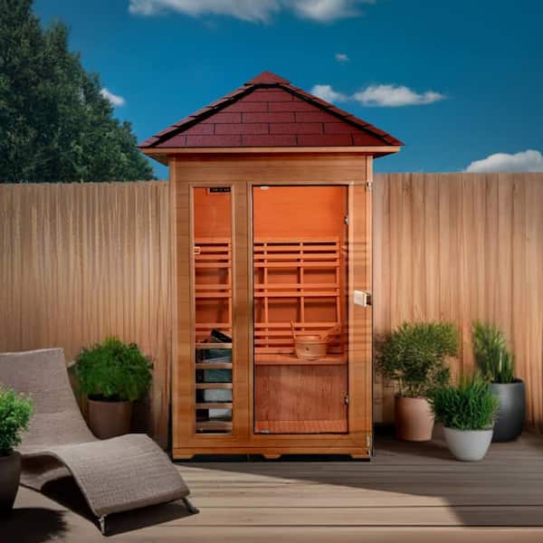 SunRay 2-person outdoor sauna with wooden exterior and glass door in backyard setting