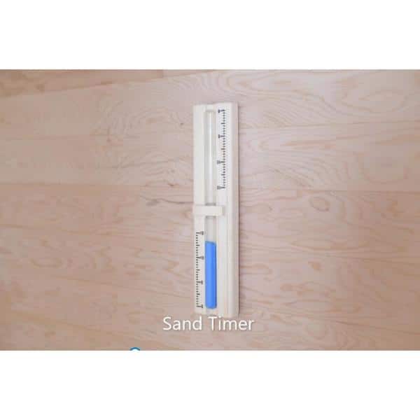 Sand timer mounted on wooden wall inside SunRay 2-person outdoor sauna for time tracking