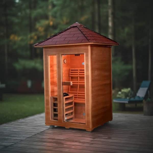 SunRay traditional 2-person outdoor sauna made of wood with glass door and shingled roof on a wooden deck