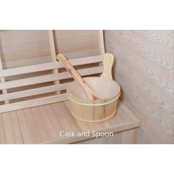Cask and spoon set inside a traditional 2-person outdoor sauna by SunRay with wooden interior
