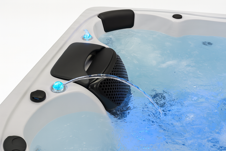 Luxury Spa premium outdoor hot tub with waterfall feature and blue LED lights in water