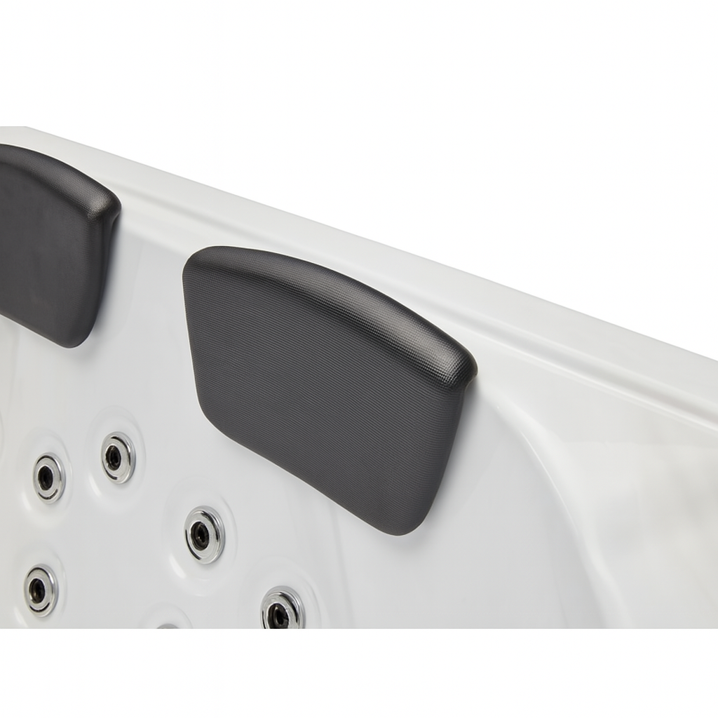 Luxury Spa Regal Studio Series hot tub close-up of black cushioned headrests and water jets