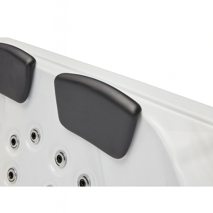 Luxury Spa Regal Studio Series hot tub close-up of black cushioned headrests and water jets
