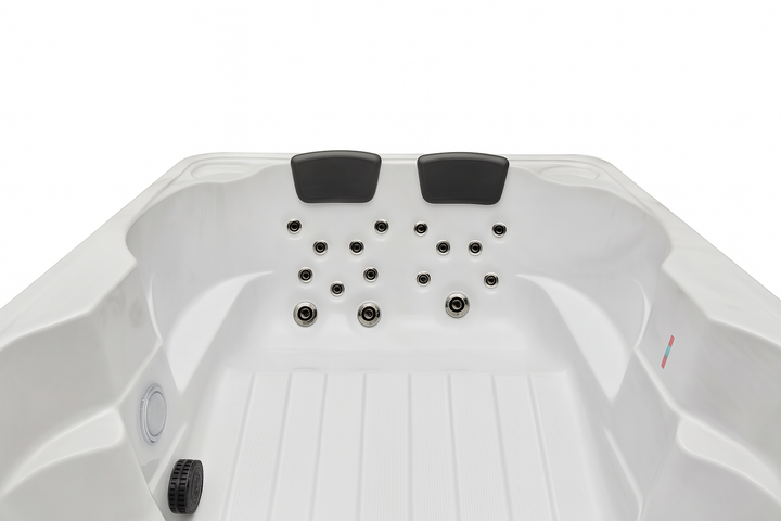 Luxury Spa Regal Studio Series hot tub with dual headrests and multiple massage jets in white