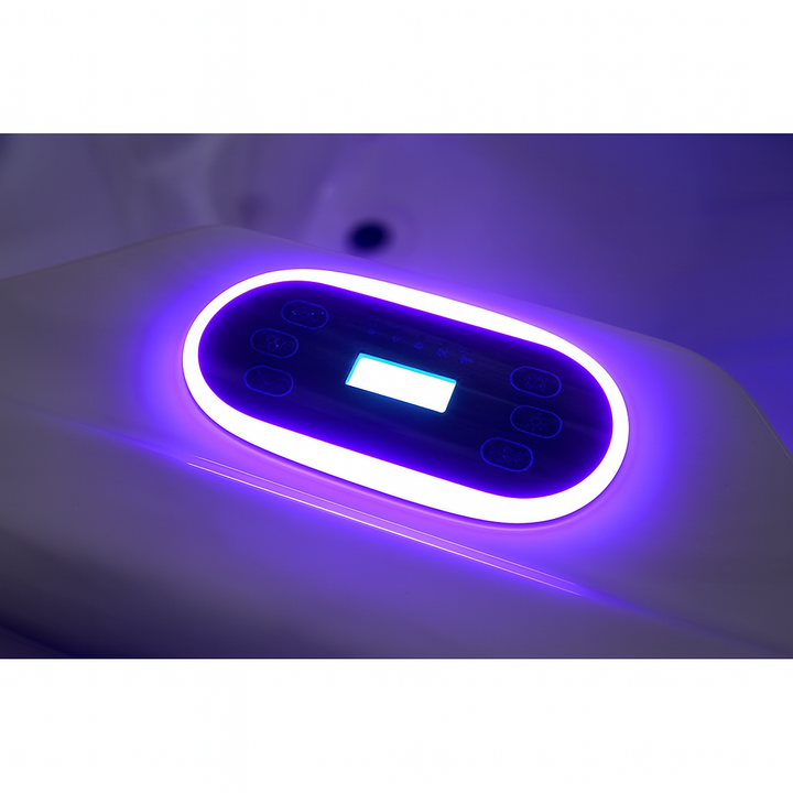 Close-up of illuminated control panel on Luxury Spa Regal Studio Series hot tub with glowing purple light