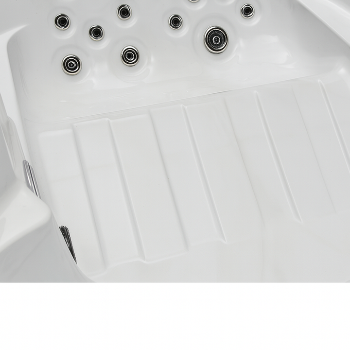 Close-up of white interior jets and seating area of Regal Studio Series hot tub by Luxury Spa