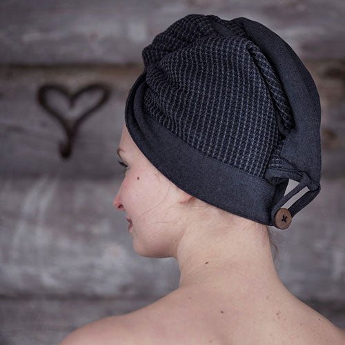 Rento Kenno hair towel in dark color, designed for quick drying and reducing frizz after washing hair