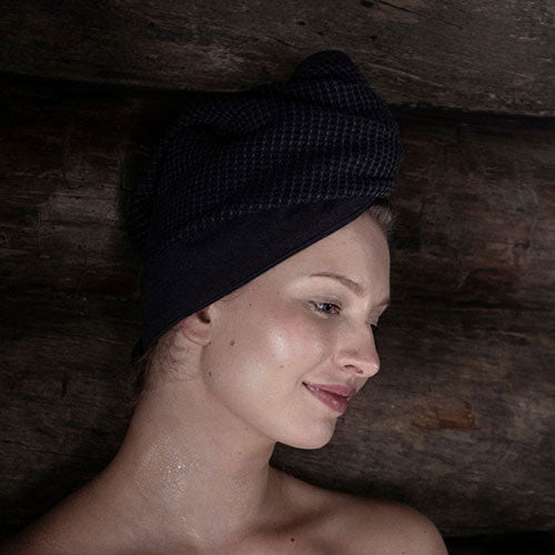 Rento Kenno hair towel in dark color, designed for fast drying and comfortable use post-shower
