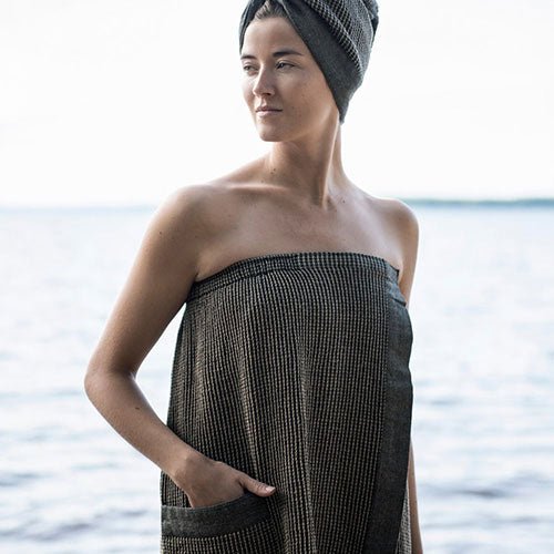 Rento luxury sauna sarong in dark gray fabric, perfect for spa or sauna use