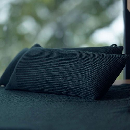 Rento Kenno sauna pillow in dark green fabric for enhanced relaxation in sauna settings