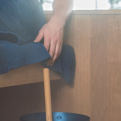 Rento sauna seat cover in use, enhancing comfort during sauna sessions with a stylish design