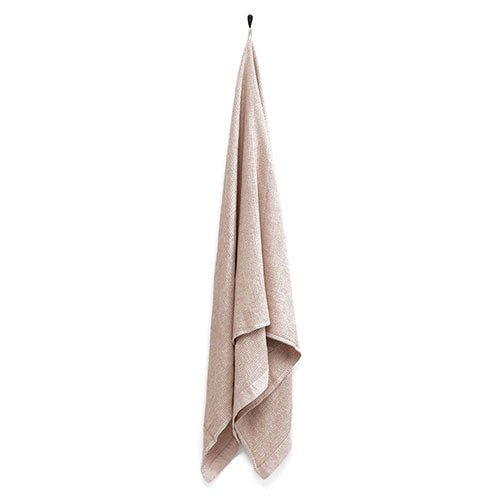 Rento Kenno spa towel in soft beige, perfect for home or wellness spa use