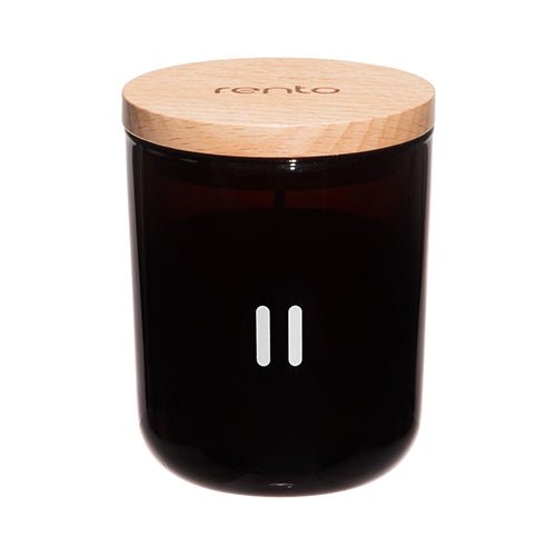 Rento luxury soy scented candle in a glass jar with a wooden lid for soothing ambiance
