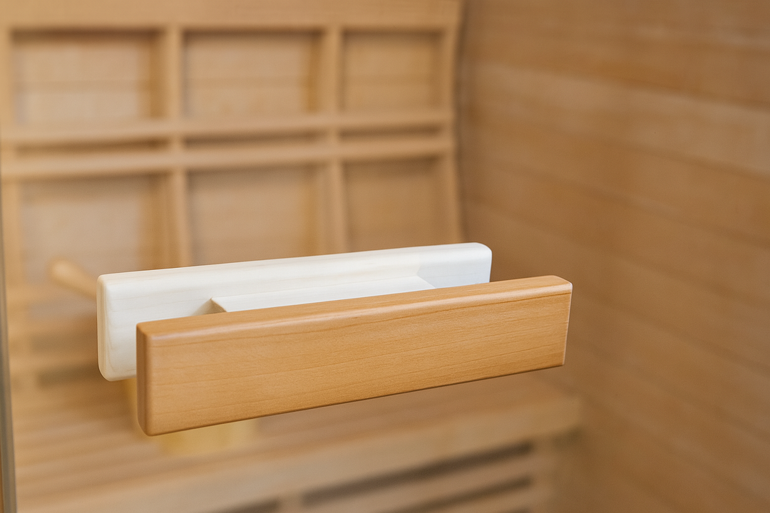 Close-up of wooden handle inside a 3-person traditional sauna by SunRay with smooth natural wood finish
