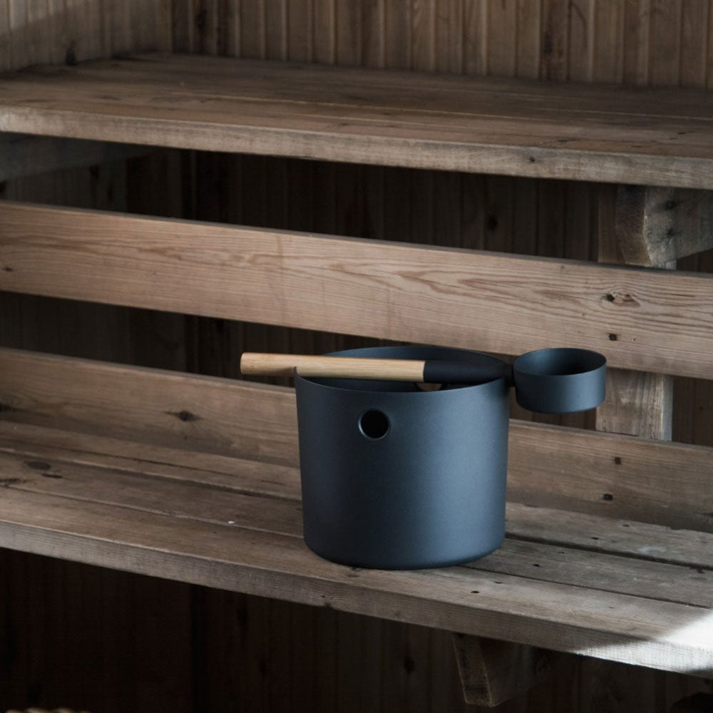KOLO sauna bucket and ladle set in black, designed for a traditional sauna experience