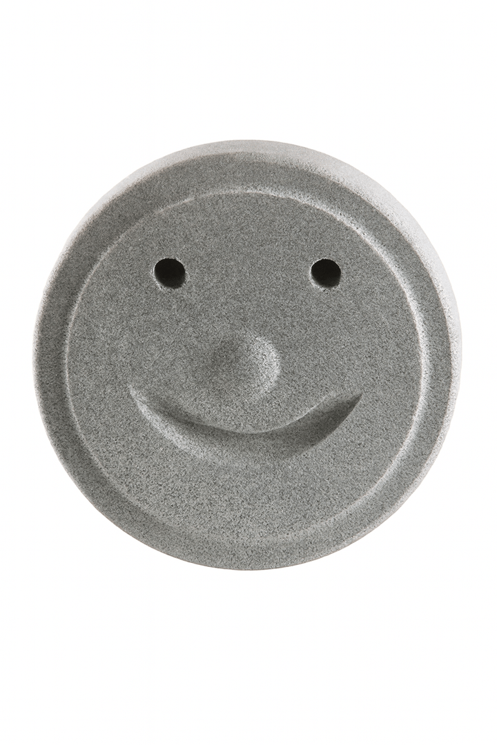 Hukka Sauna Smiley Stone in Gray, designed for enhancing sauna experiences with a cheerful touch